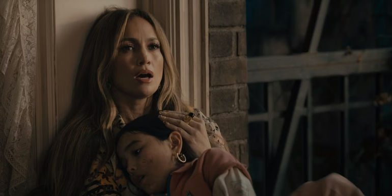 Jennifer Lopez Holding A Younger Version Of Her In This Is Me Now: A Love Story.jpg