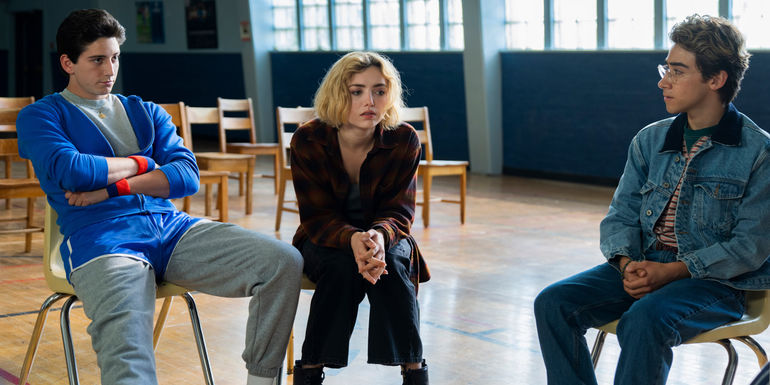 Maddie sits in the middle of the support group in School Spirits.