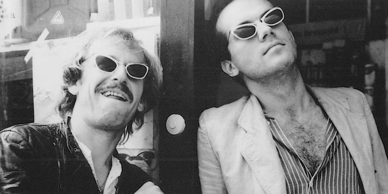 Rüdiger Vogler as Bruno Winter and Hanns Zischler as Robert Lander wearing matching sunglasses in Kings of the Road