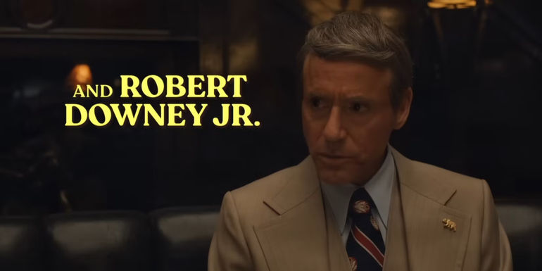 Robert Downey Jr. in a disguise with his name written on screen in The Sympathizer trailer
