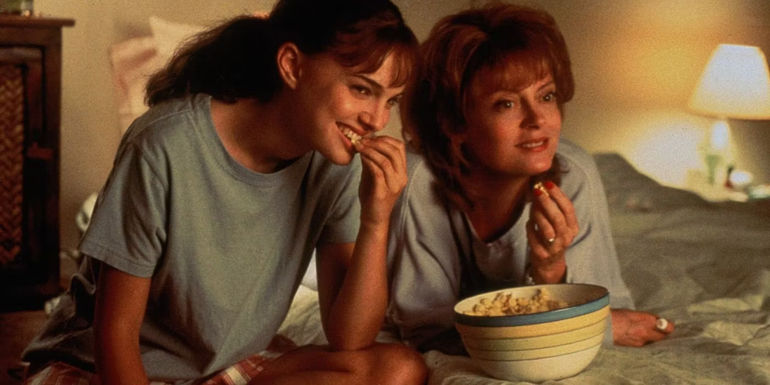 Ann and Adele August watching a movie in Anywhere But Here