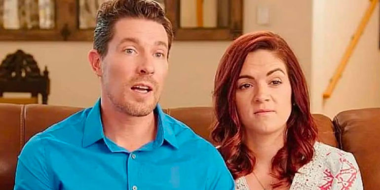 Garrick and Dannielle from Seeking Sister Wife talking on couch during interview