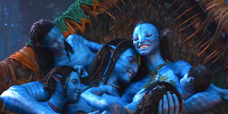 The Sully family huddled on a hammock in Avatar: The Way of Water