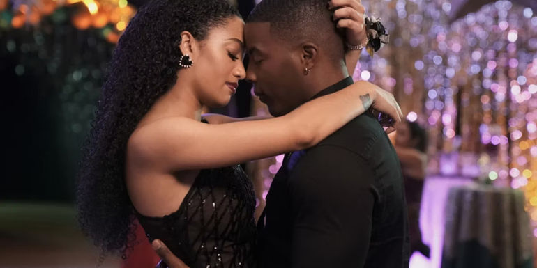 Olivia and Spencer dancing together in All American