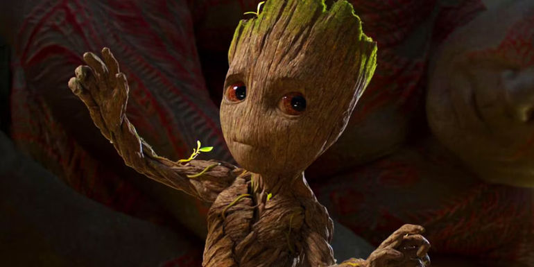 Groot dancing and being watched by Drax in Guardians of the Galaxy Vol. 2