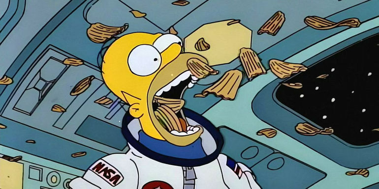 Homer dressed as astronaut eating chips in space in The Simpsons season 5 episode 15 Deep Space Homer