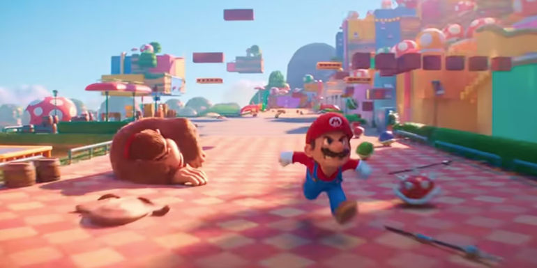 Mario running and Donkey Kong knocked out in The Super Mario Bros. Movie.