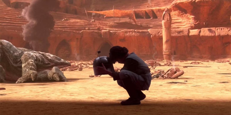 Boba Fett holds his dad's head in Attack of the Clones