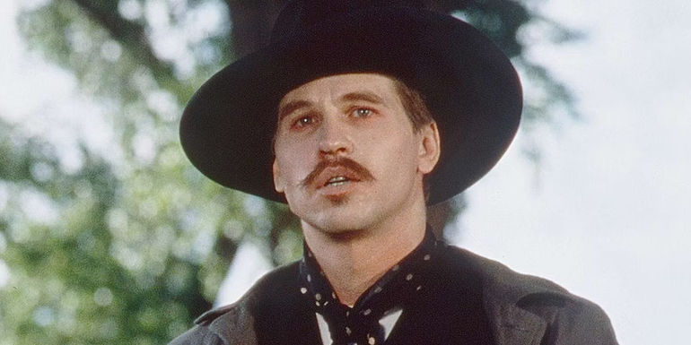 Doc Holliday (Val Kilmer) looking shocked in Tombstone