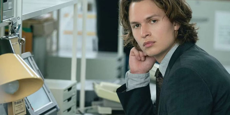 Jake Adelstein behind his desk in Tokyo Vice.