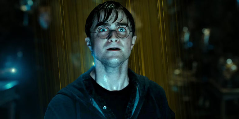 Daniel Radcliffe as Harry Potter looking concerned in Harry Potter and the Deathly Hallows Part 2