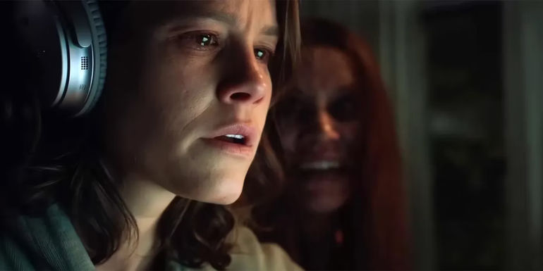 Emily shrouded in darkness in The Whispering Shadows