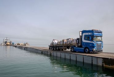 Humanitarian Aid Arrives in Gaza Through US Pier and Begins Distribution Despite Challenges