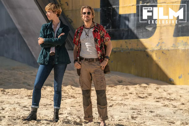 Dan Stevens in a Hawaiian shirt in Godzilla x Kong on a beach