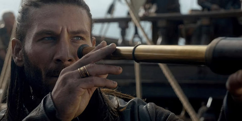 Charles Vane looks through a telescope in Black Sails.