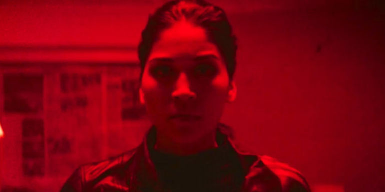 Maya Lopez in red light in Hawkeye