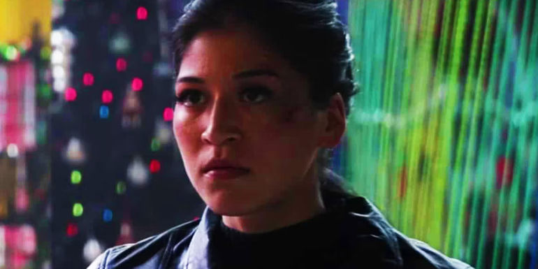 Maya Lopez with colorful background in Hawkeye