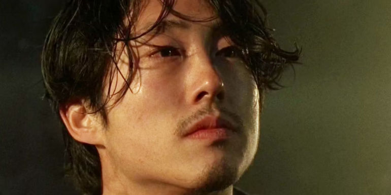 Steven Yeun as Glenn looking worn out in The Walking Dead season 7.