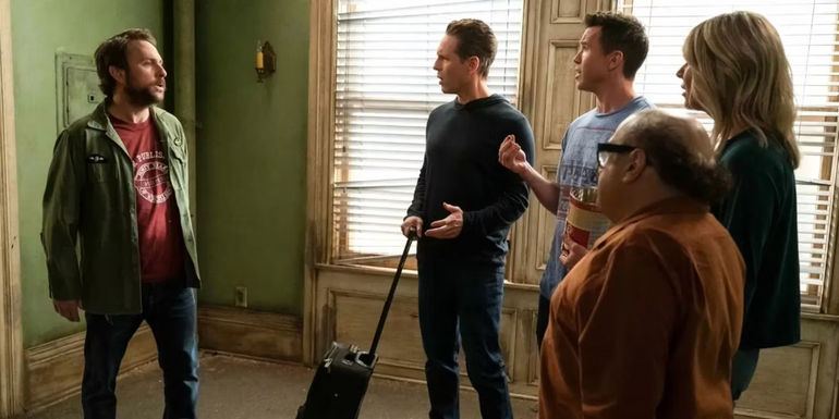 The gang standing in one of Charlie's (Charlie Day) hidden empty rooms in his apartment in It's Always Sunny in Philadelphia