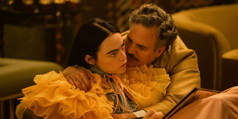 Mark Ruffalo embracing Emma Stone in Poor Things.