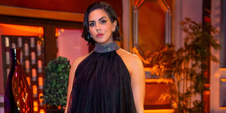 Katie Maloney in a black dress at the Vanderpump Rules season 10 reunion