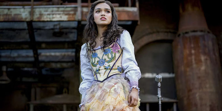 Lucy Gray is in her rainbow dress in The Ballad of Songbirds and Snakes.