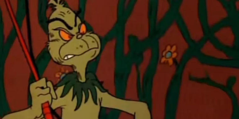 The Grinch holds a whip in Halloween Is Grinch Night