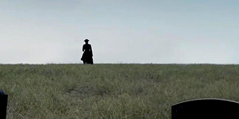 Silhouette of Ruth Morris as 40-year-old Mattie in the ending of True Grit