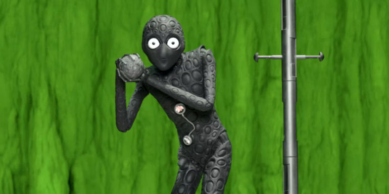 The alien grabs the asteroid in Asteroid City