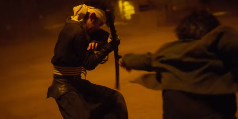 Yusuke punches Hiei in Yu Yu Hakusho episode 3