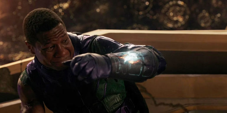 Kang (Jonathan Majors) watches his gauntlet malfunction in Ant-Man and the Wasp Quantumania
