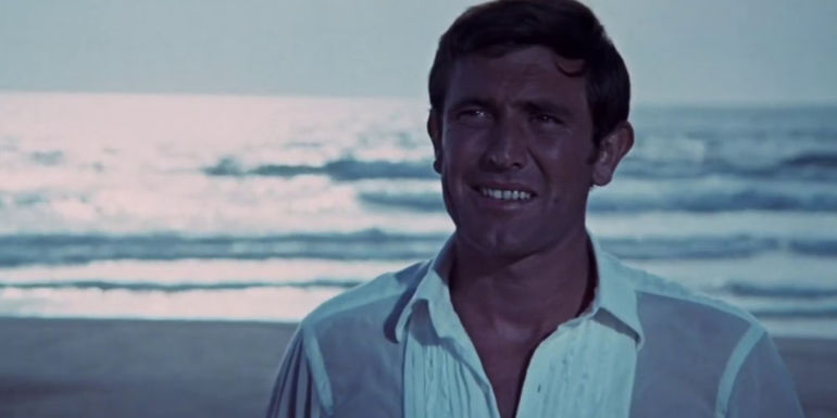 George Lazenby on a beach in On Her Majesty's Secret Service