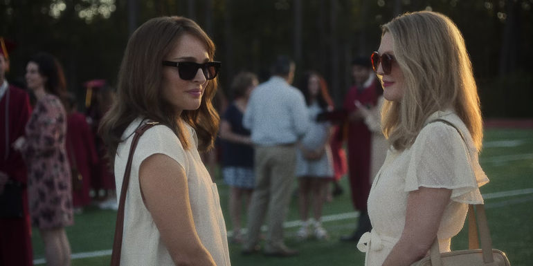 Elizabeth (Natalie Portman) and Gracie (Julianne Moore) on a field in May December