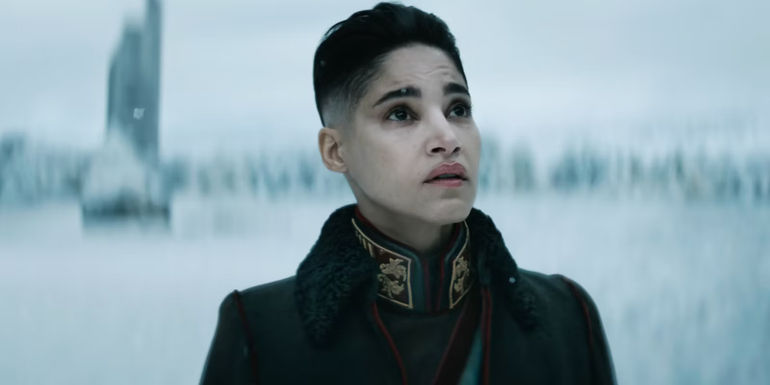 Sofia Boutella as Kora looking up into the sky in Rebel Moon