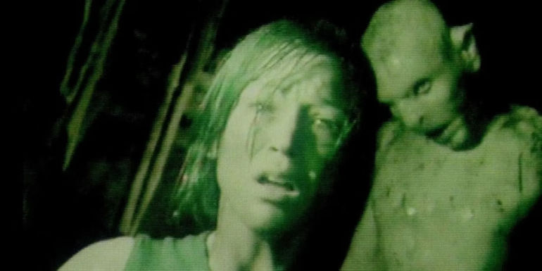 A woman and a creature/crawler in The Descent.