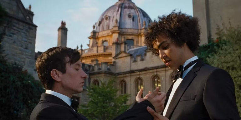 Archie Madekwe as Farleigh with Barry Keoghan as Oliver at Oxford in Saltburn