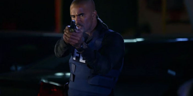 Derek Morgan aiming a gun in Criminal Minds.