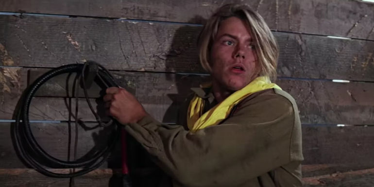 Young Indiana Jones grabs a whip in indiana jones and the last crusade.