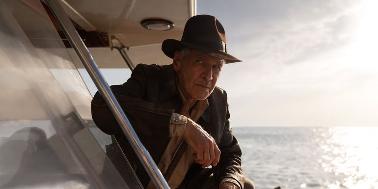 Indiana Jones on a boat in Indiana Jones and the Dial of Destiny