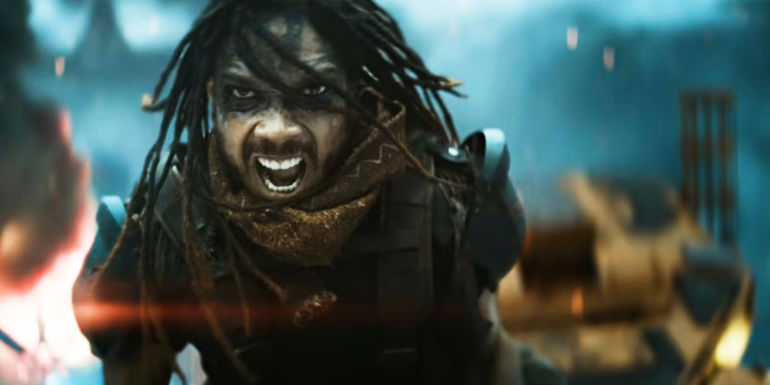 Ray Fisher's Darrian Bloodaxe charging forward while yelling in Rebel Moon_ Part 1