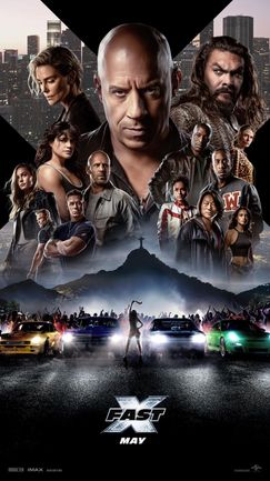 Movie poster with Vin Diesel and a cast above racing cars, titled 