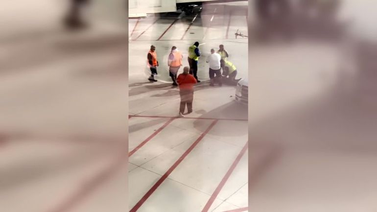 Passenger Jumps onto Southwest Airlines Plane Wing Through Emergency Exit at the Gate
