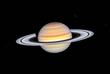 Hubble Telescope Uncovers Enigmatic Shadows Cast on Saturn's Rings