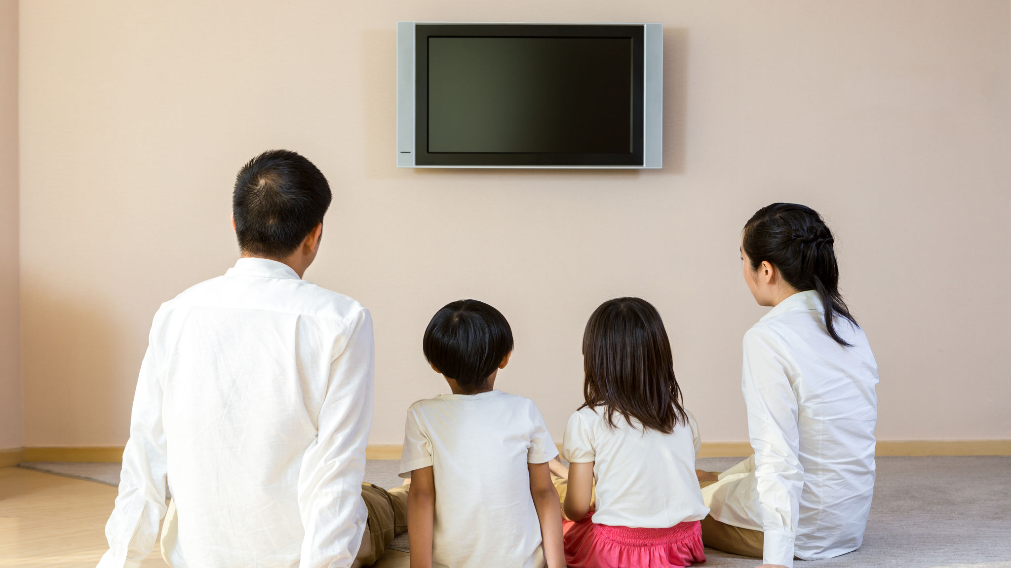 Happy family enjoying television