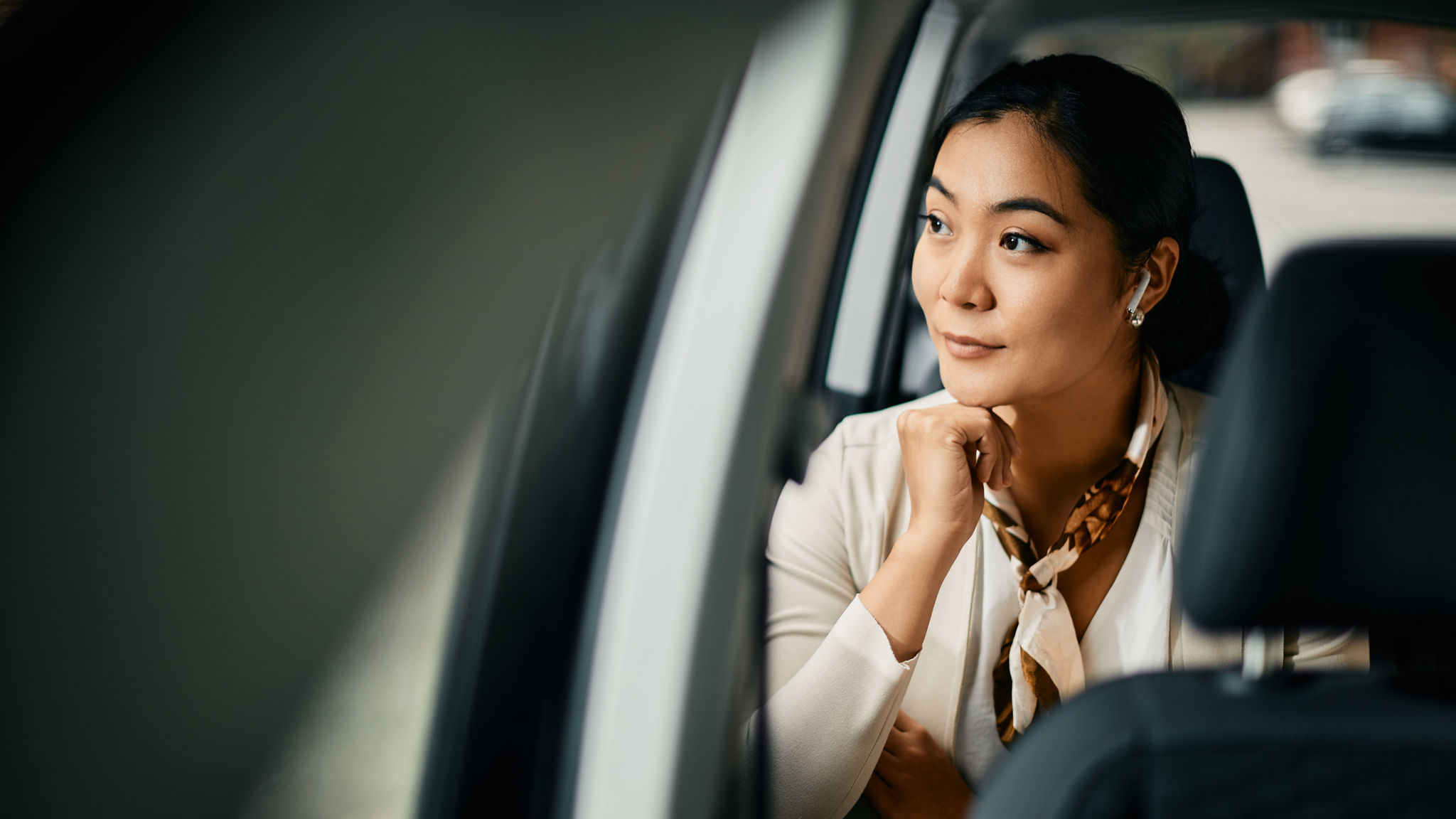 A woman sitting in a car 