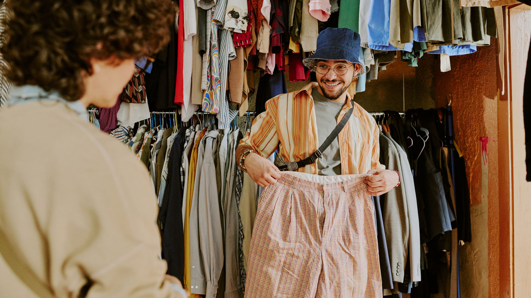 Person trying on clothes in casual shop