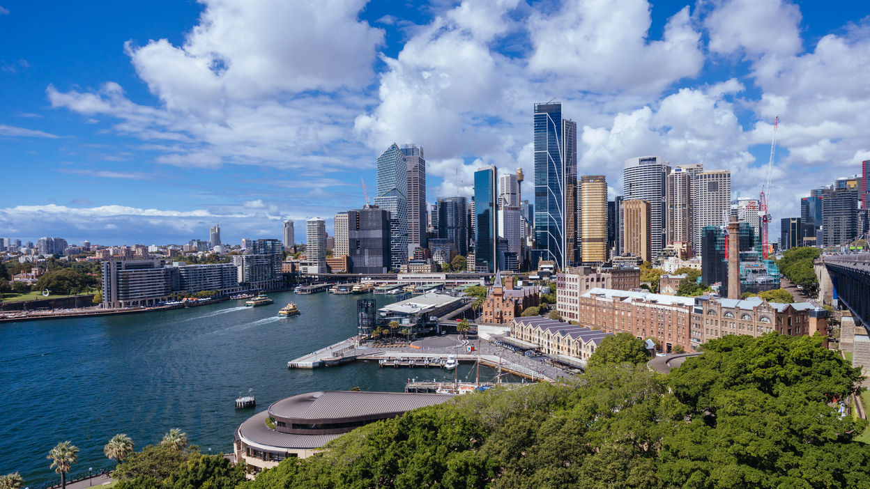 sydney-skyline-from-the-harbour-bridge-in-australi-2023-04-20-20-56-57-utc