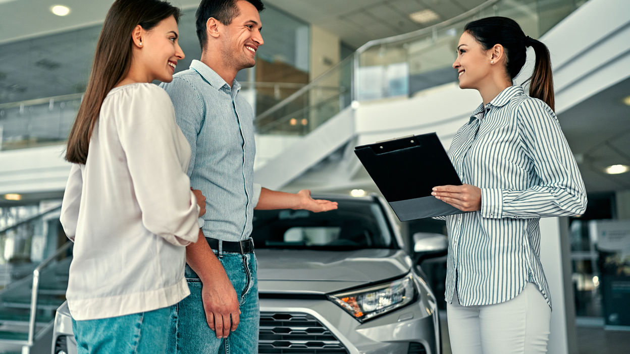 at-a-car-dealership-buying-a-car-2021-11-12-21-01-34-utc