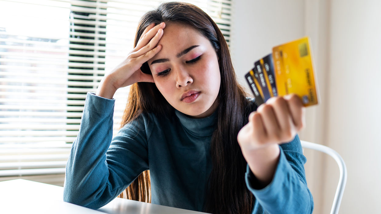 woman-looking-worried-about-bill-no-money-to-payi-2023-03-15-02-02-41-utc