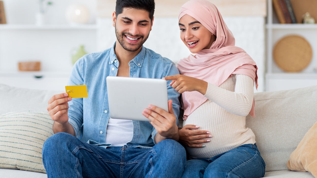 excited-pregnant-islamic-spouses-shopping-online-w-2022-12-16-06-32-14-utc